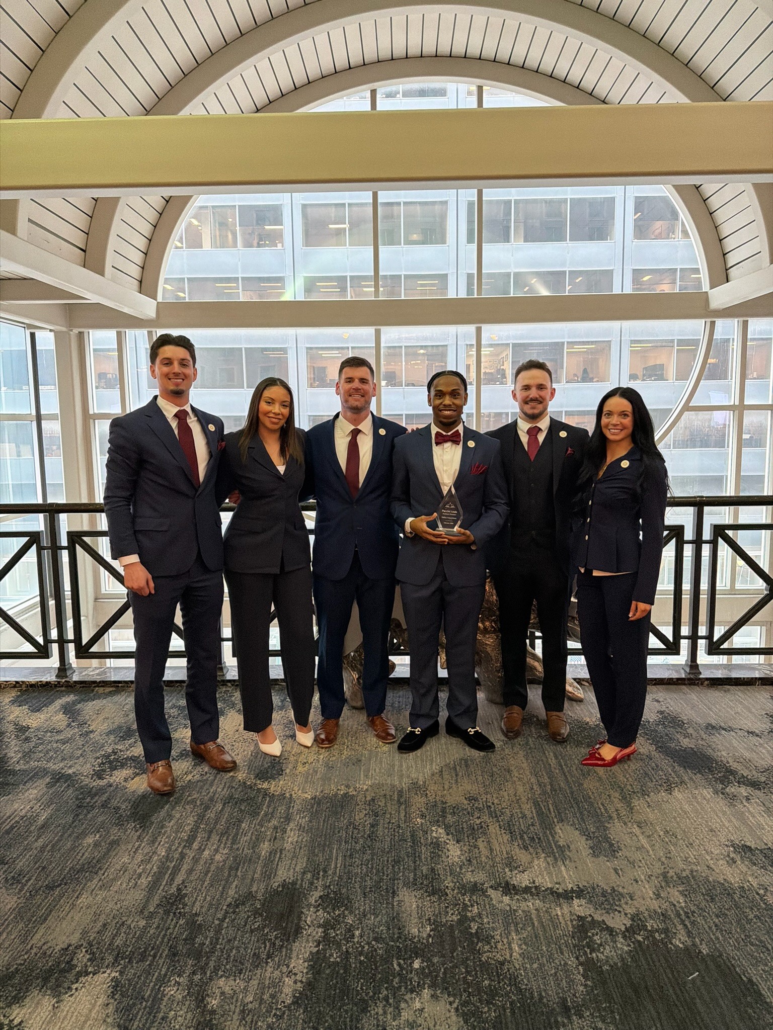 Pinnacle Enterprises team engaging customers in retail environment